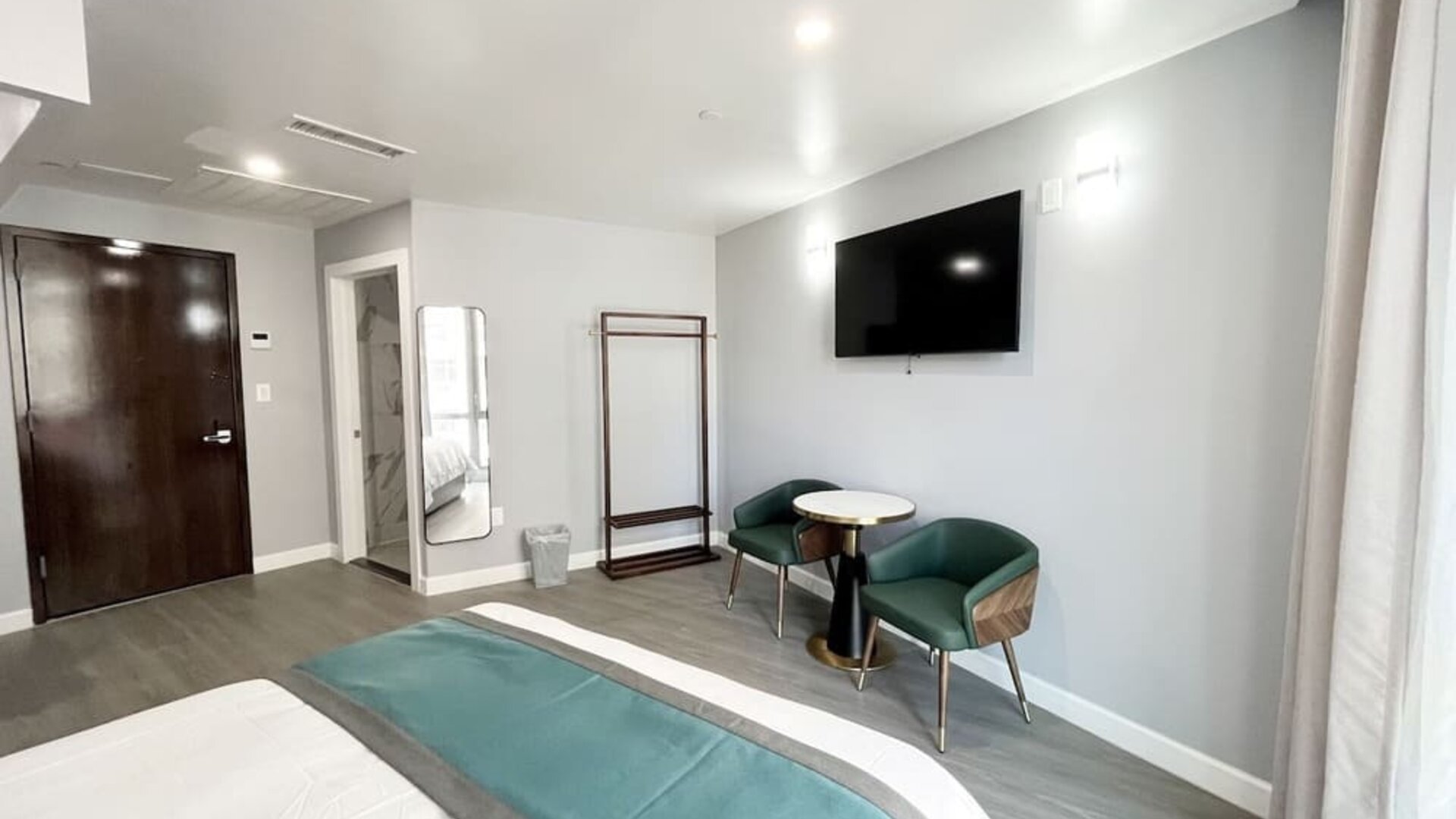 Day room with TV and natural light. 