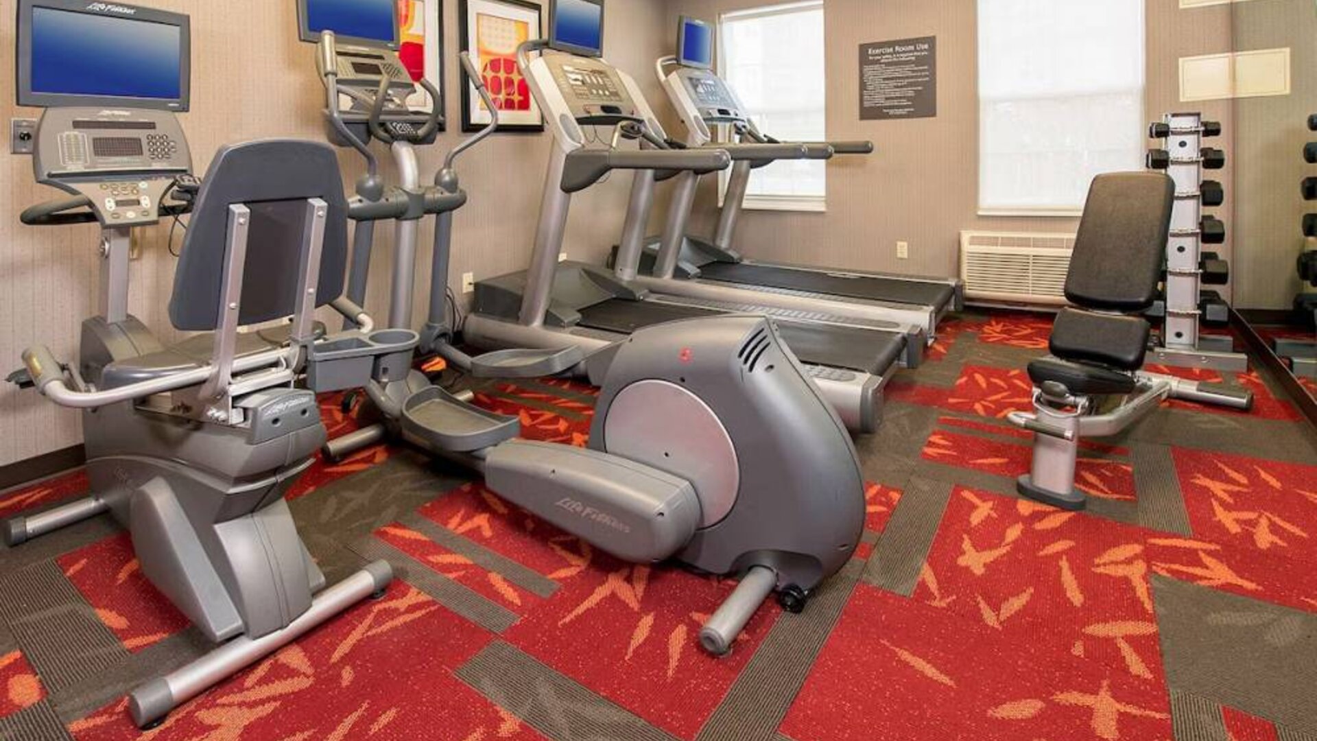 Sonesta ES Suites Charlottesville University’s fitness center is equipped with a range of exercise machines, in addition to free weights and a bench.