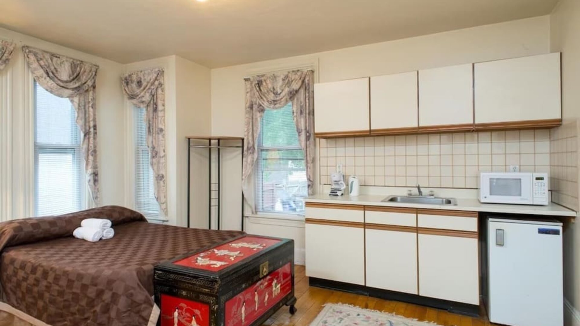 Day use room with natural like and small kitchen area at The Farrington Inn.