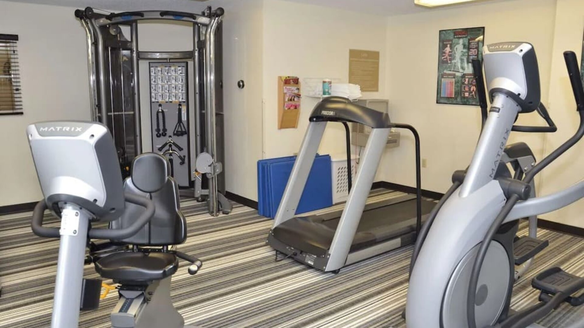 Fitness center at Sonesta Simply Suites Detroit Warren.