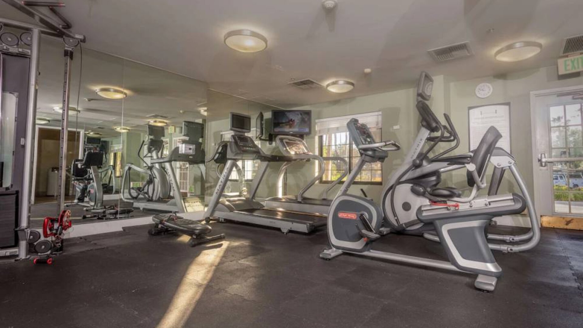 Sonesta ES Suites Anaheim Resort Area’s fitness center is equipped with a wide range of different exercise machines, and has a wall-mounted television.