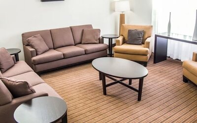 Lobby and lounge ideal for coworking at Sleep Inn Tinley Park.