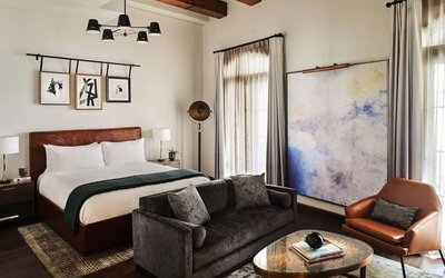 King room with lounge area at Hotel Figueroa.