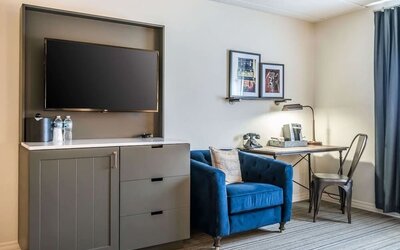Day use room with TV and work space at EnVision Hotel St. Paul South.