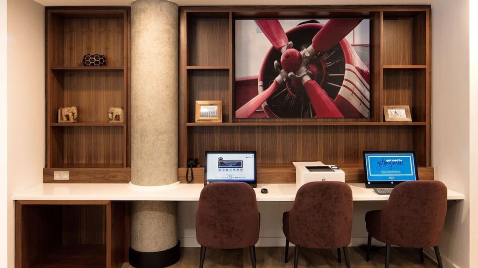 Business center with PC, internet, and printer at Hampton By Hilton London Stansted Airport.