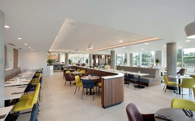 Lounge and coworking space at Hampton By Hilton London Stansted Airport.