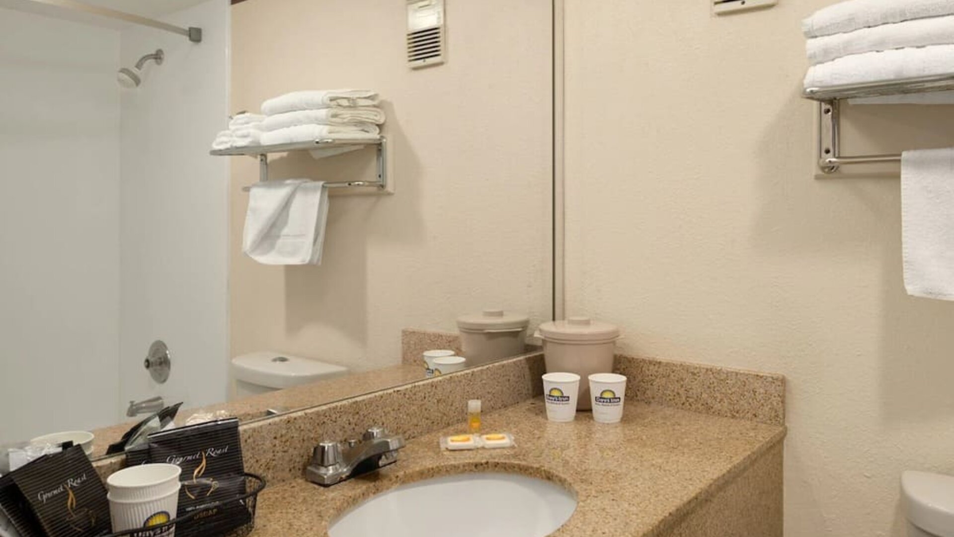 Private guest bathroom at EnVision Hotel Miami International Airport.