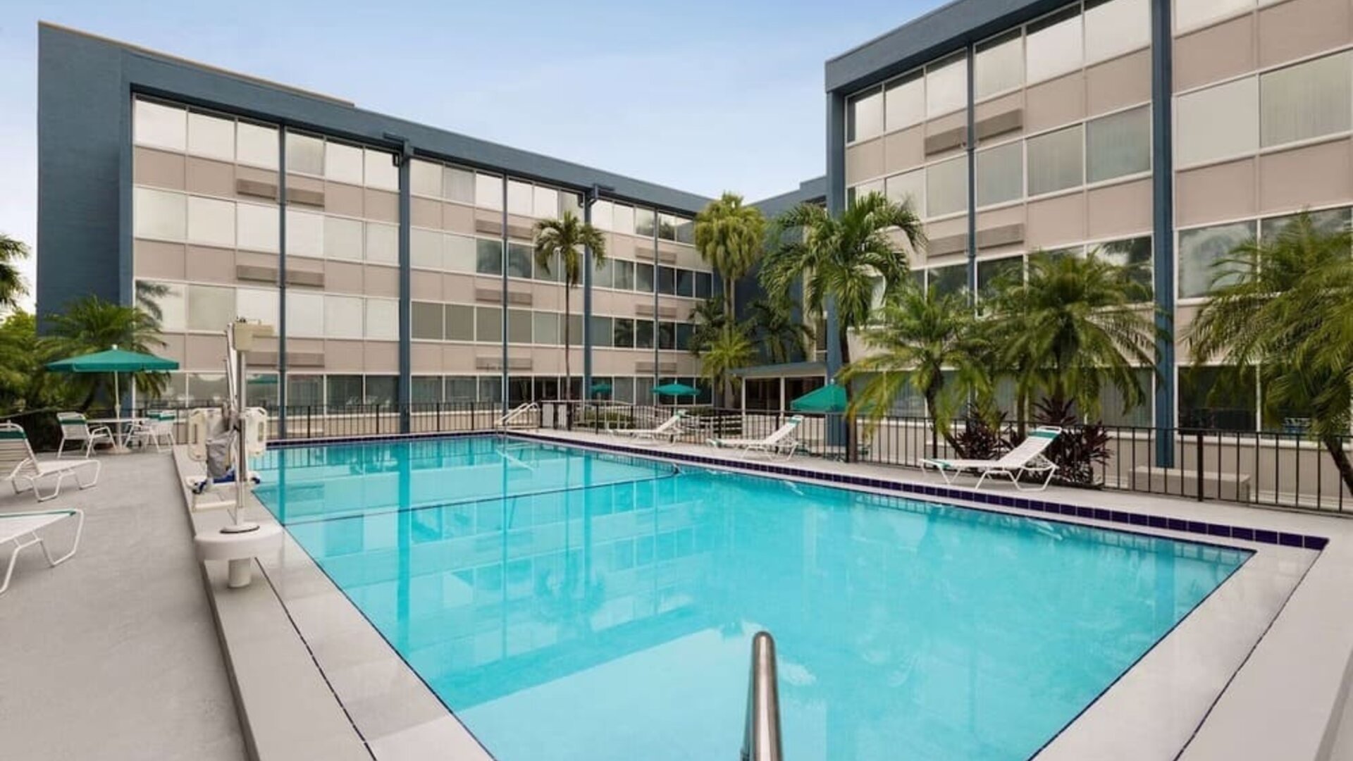 Beautiful outdoor pool at EnVision Hotel Miami International Airport.
