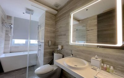 Private bathroom with shower at Fraser Place Puteri Harbour.