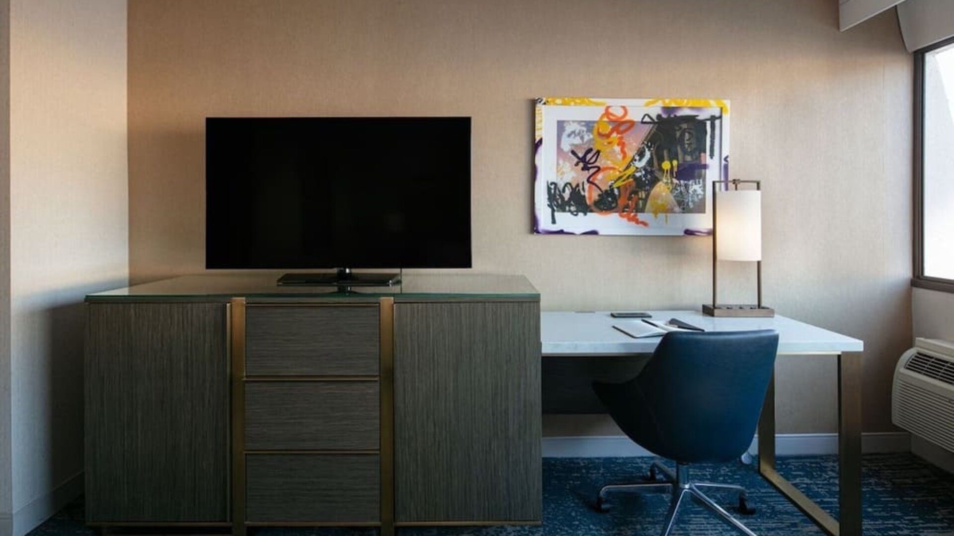 King room with TV and work station at Hotel Dena, Pasadena Los Angeles.