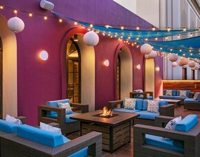 Coworking space, lounge, and fire pit at Hotel Dena, Pasadena Los Angeles.