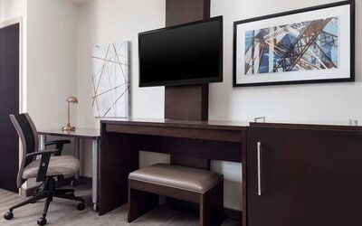 Day use room with TV and work station at Fairfield Inn & Suites By Marriott New York Staten Island.