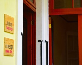 Dining and coworking space at Casa María Hostal.