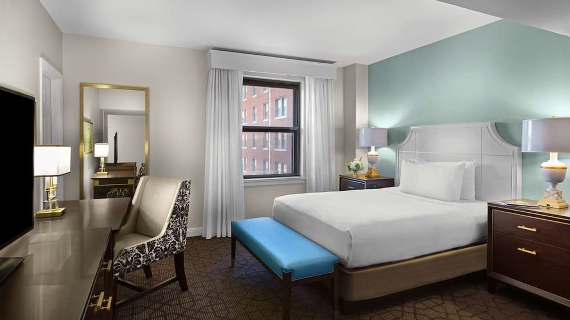 Spacious king room with TV at The Chase Park Plaza Royal Sonesta St. Louis.