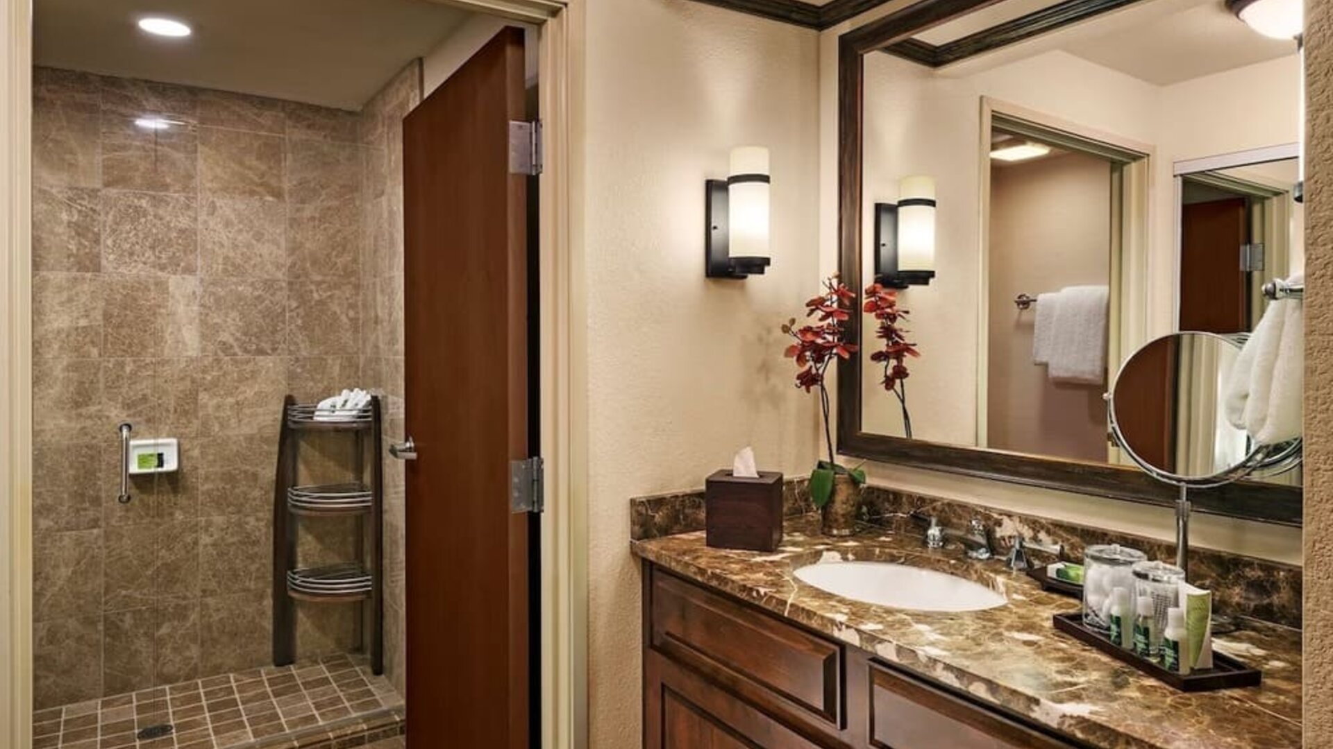 Guest bathroom with shower at Sonesta Suites Scottsdale Gainey Ranch.