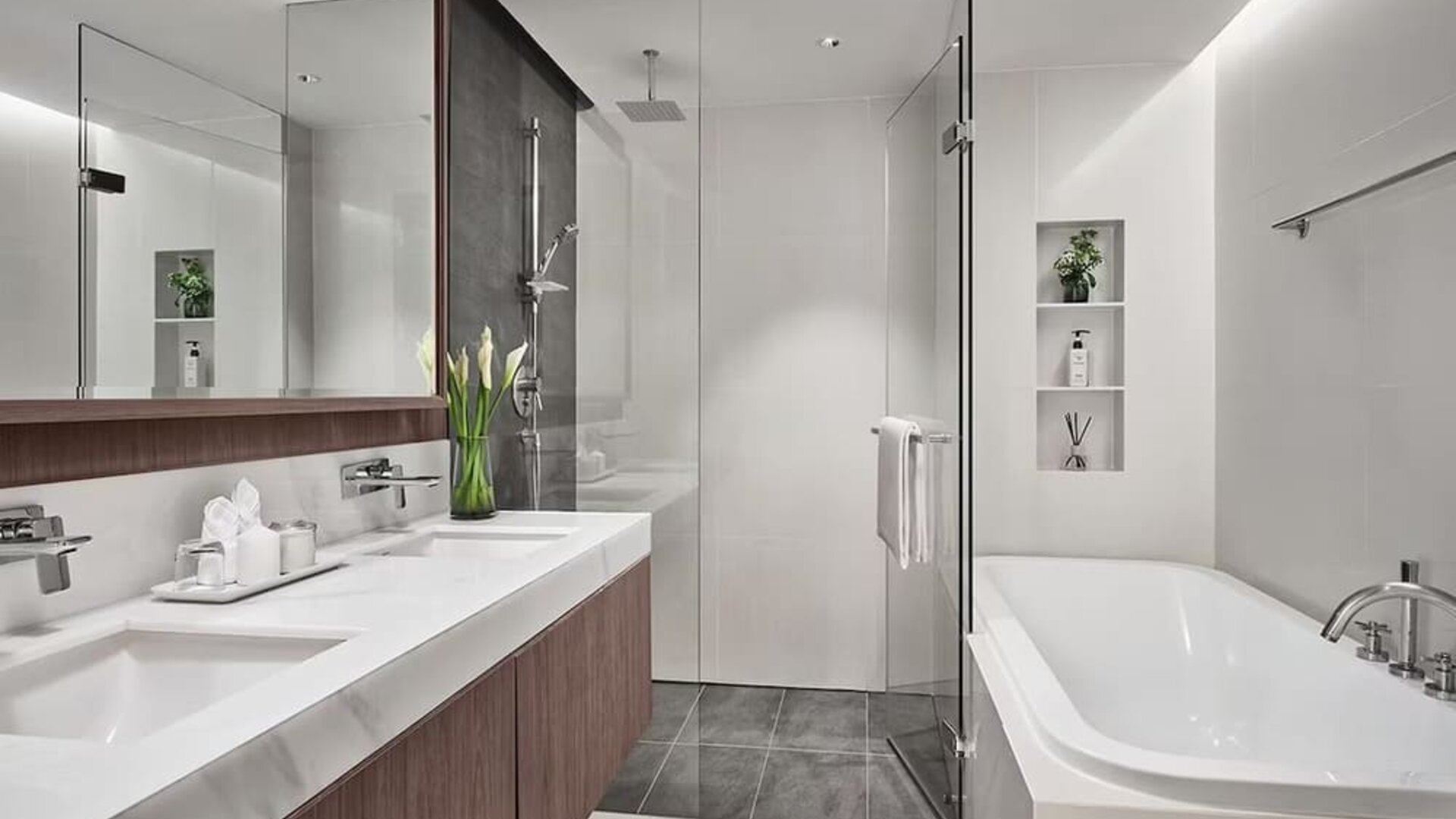Guest bathroom with shower at Fraser Suites Sukhumvit, Bangkok.