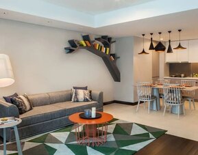 Spacious day use room with lounge and kitchen at Fraser Place Setiabudi Jakarta.