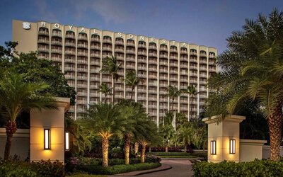 Hotel exterior at night at Royal Sonesta San Juan.