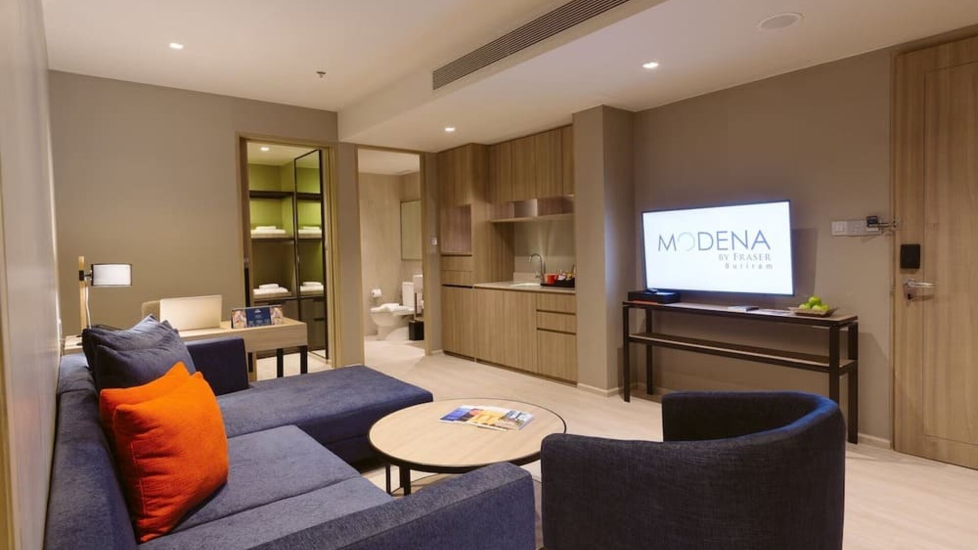 King room with lounge area at Modena By Fraser Buriram.