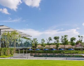Outdoor fitness area and garden at Modena By Fraser Buriram.