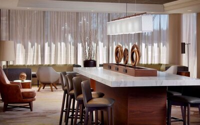 Coworking space and bar area at Sonesta Select Atlanta Cumberland Galleria.
