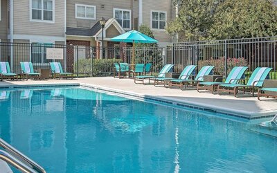 Outdoor pool at Sonesta ES Suites Raleigh Durham Airport Morrisville.