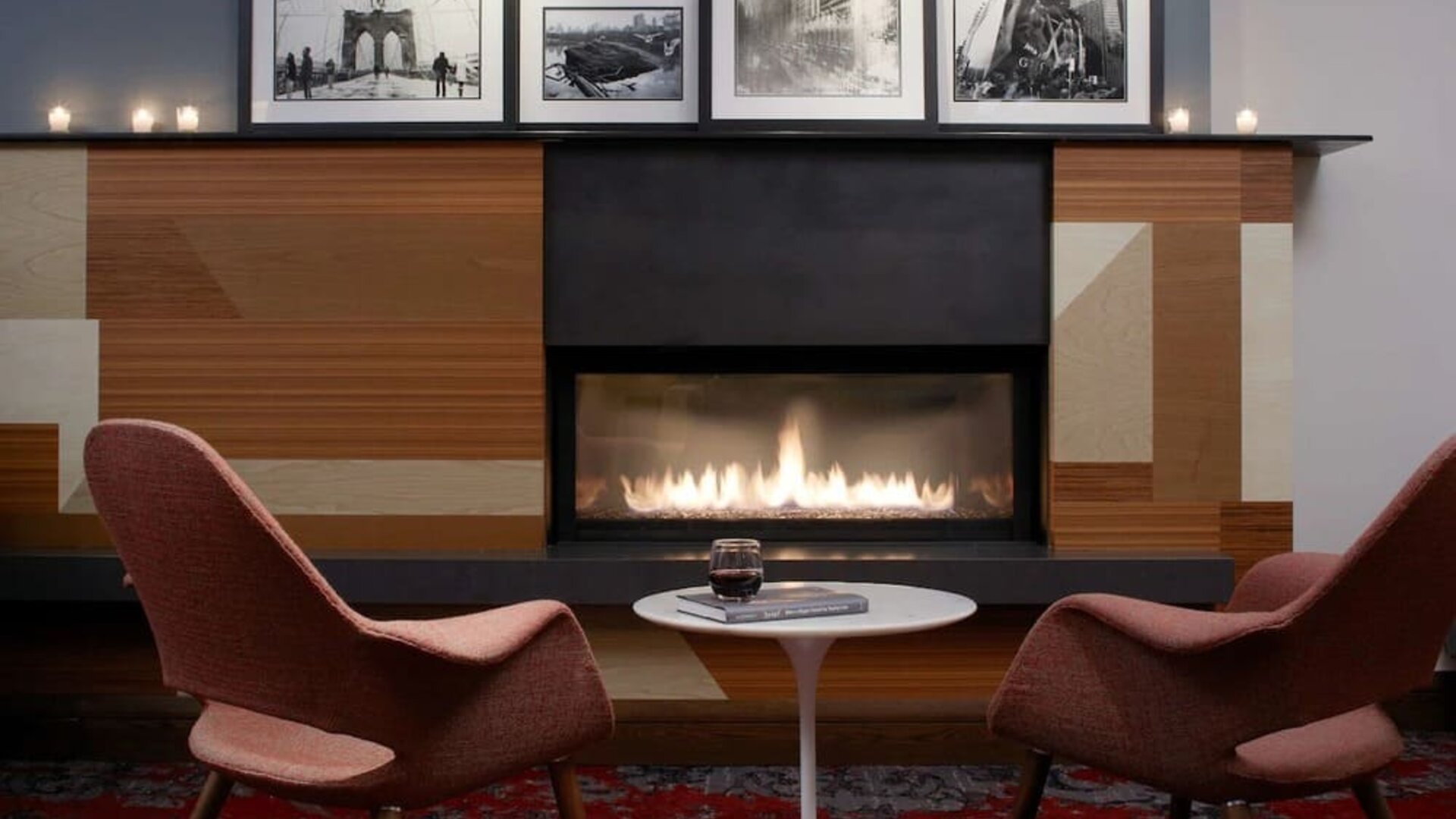 Cozy lounge with fire place at The Fifty Sonesta Select New York.