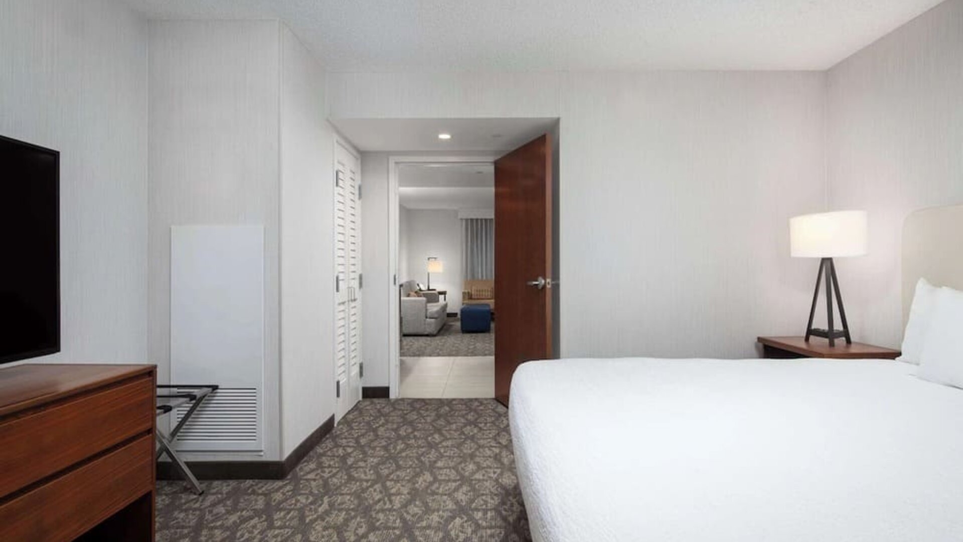 King room with TV at Embassy Suites By Hilton Portland Airport.