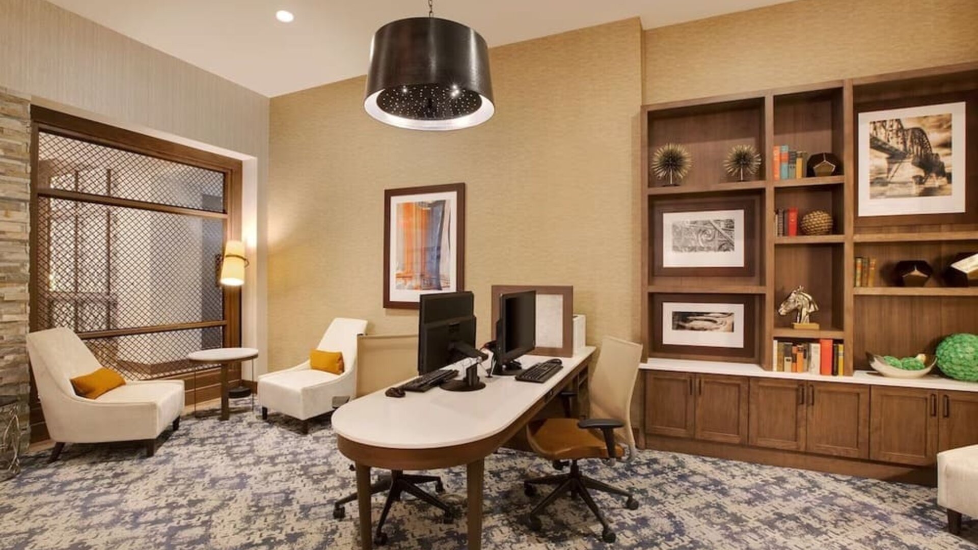 Business center at Homewood Suites By Hilton Louisville Downtown.