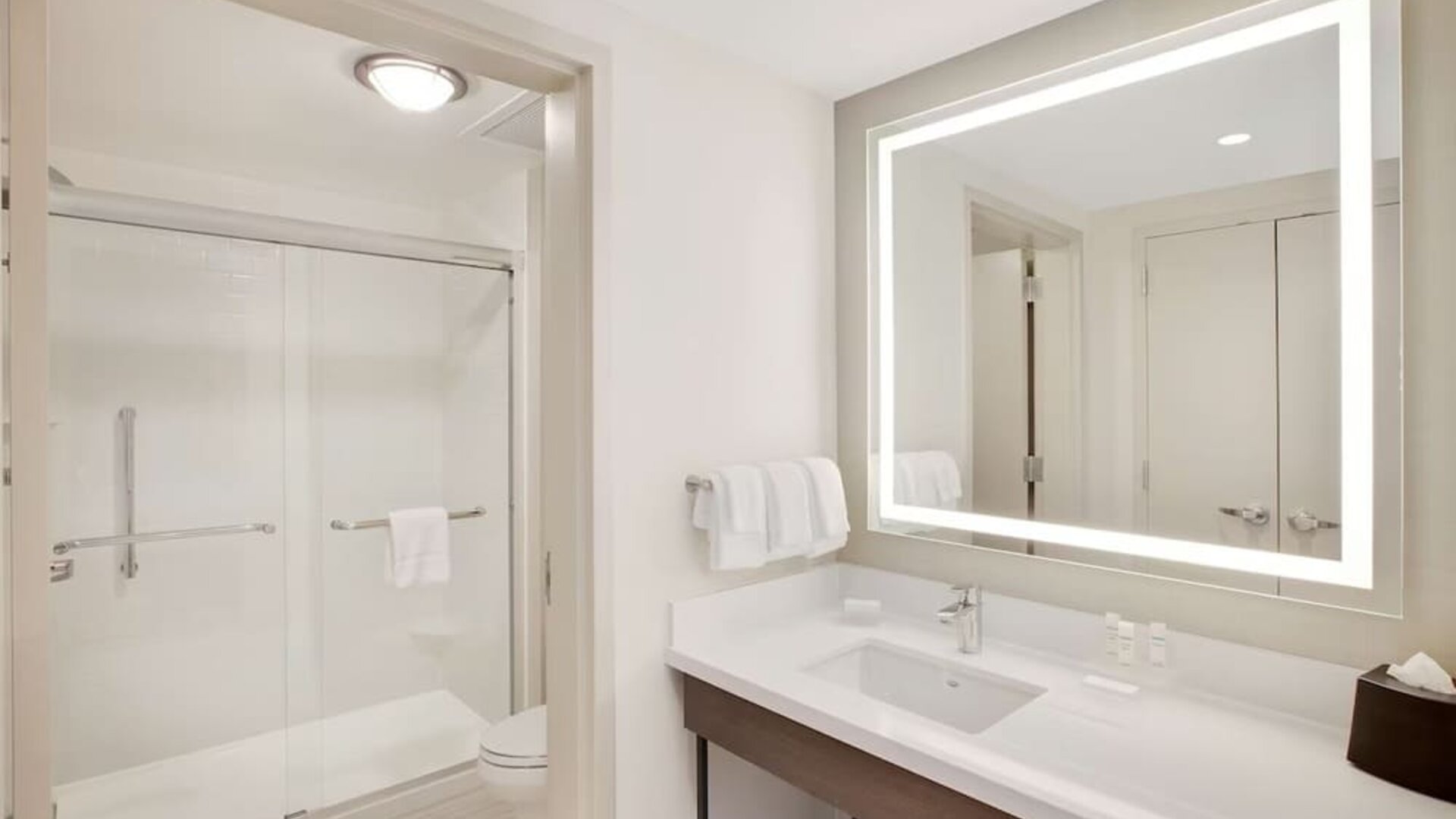 Private bathroom at Homewood Suites By Hilton Louisville Downtown.