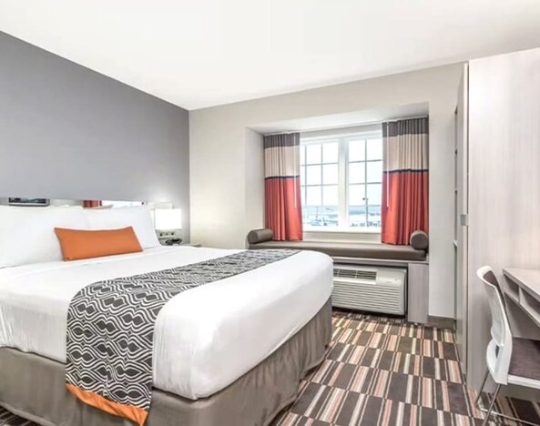 Day room with natural light at Coratel Inn & Suites By Jasper Rochester.