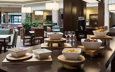 Dining room at Embassy Suites By Hilton Denver Tech Center.