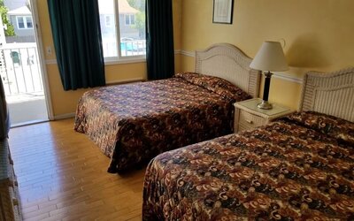 Day use room with two double beds at Bay Breeze Motel.