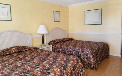 Two king beds at Bay Breeze Motel.