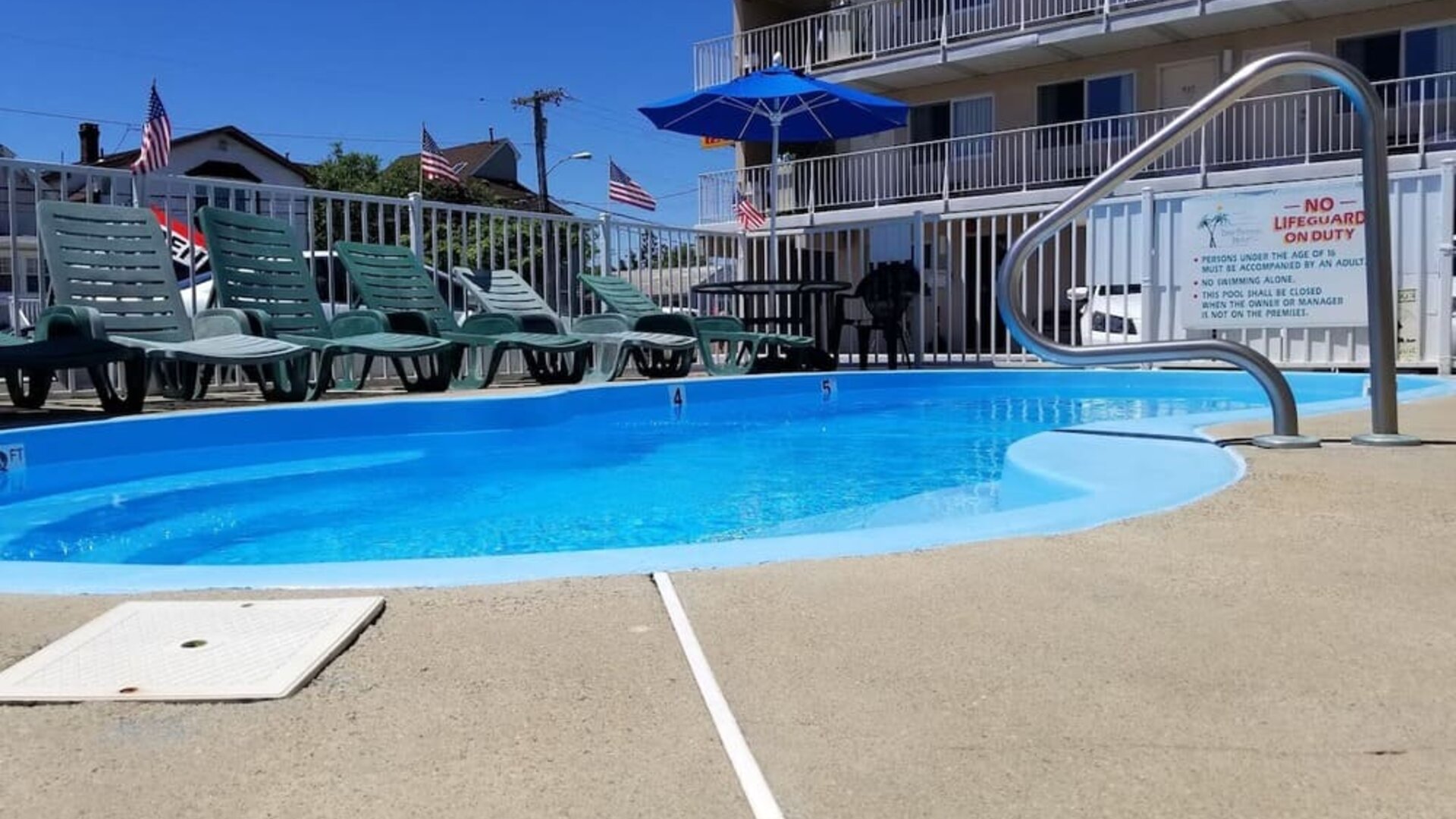 Relaxing outdoor pool at Bay Breeze Motel.