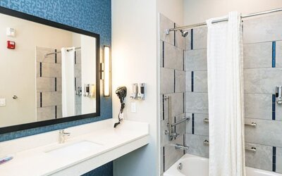 Private bathroom with tub at Palace Inn Blue Laura Koppe Rd.