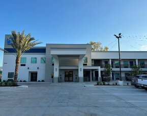 Parking available at Palace Inn Blue Laura Koppe Rd.