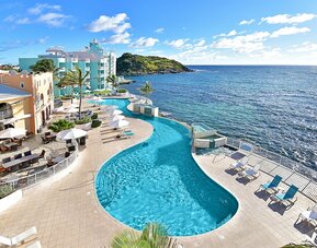 Daytime angle of glistening Infinity Pool at Oyster Bay Resort in St. Maarten.