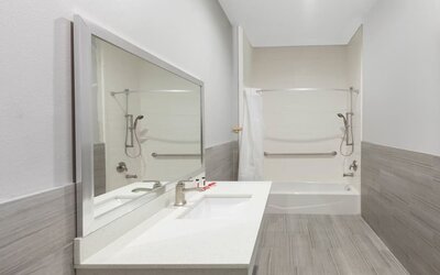 Guest bathroom at Baymont By Wyndham Houston Hobby Airport.