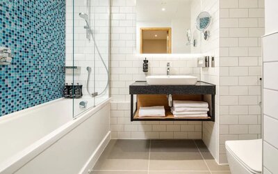 Private bathroom with shower at Holiday Inn Manchester Airport.  