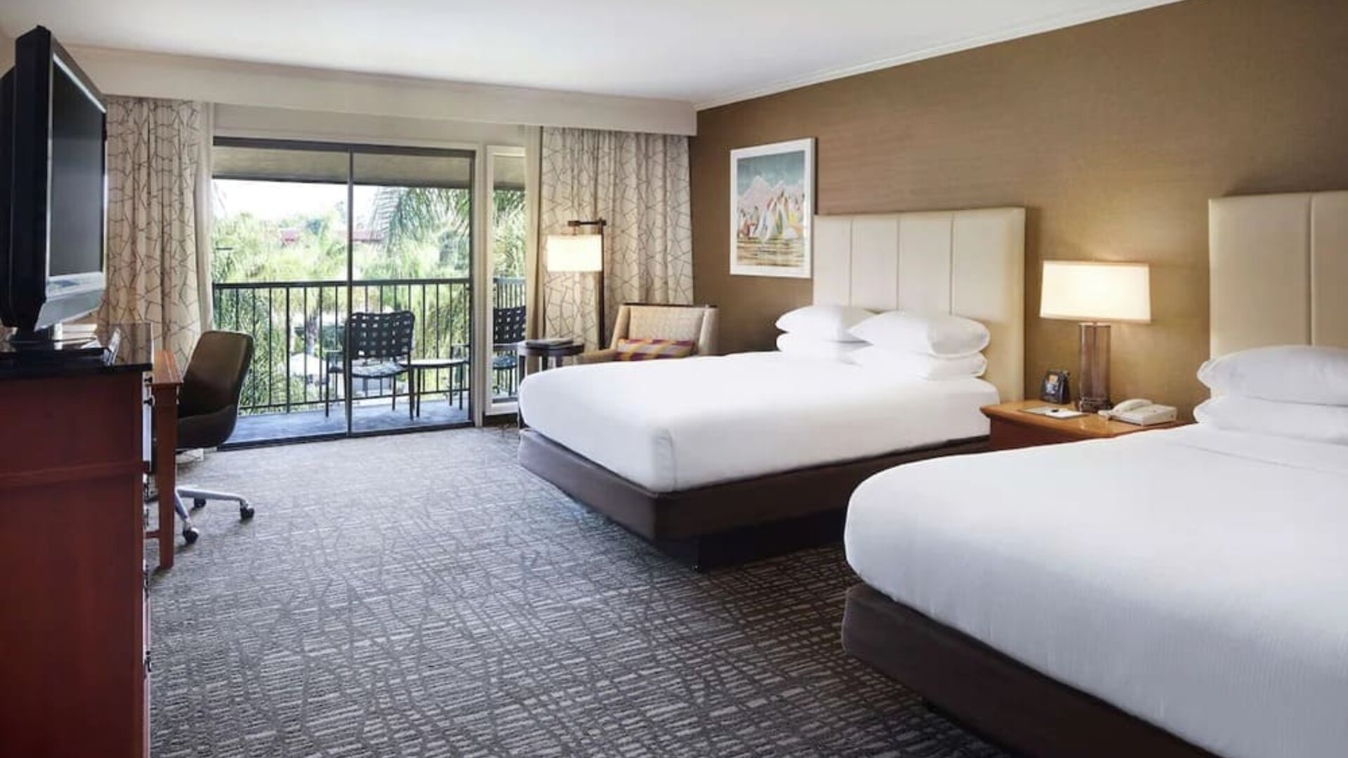 Two queen beds with balcony at DoubleTree By Hilton Ontario Airport.