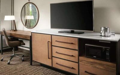 Work space with desk and TV at DoubleTree By Hilton Ontario Airport.