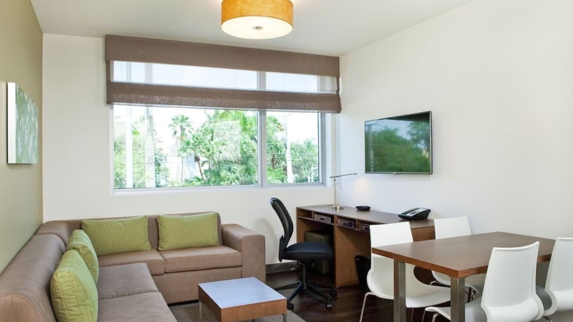 Day room with lounge area at Element Miami Doral.