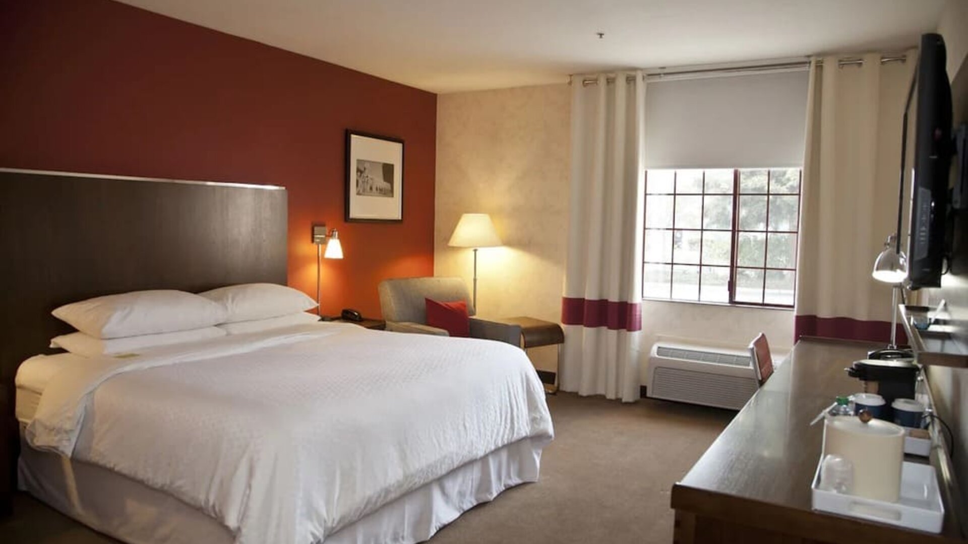 King room with TV at La Hacienda San Jose Silicon Valley.