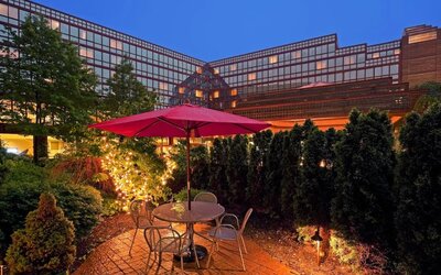 Outdoor terrace at Laguardia Plaza Hotel.