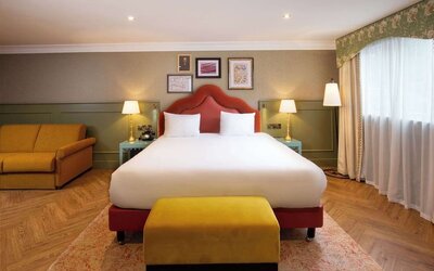 Day use room with lounge chair at Elmbank York, Tapestry Collection By Hilton.