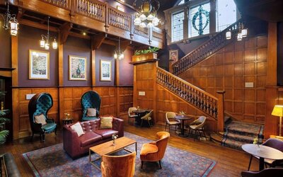 Lobby and library at Elmbank York, Tapestry Collection By Hilton.
