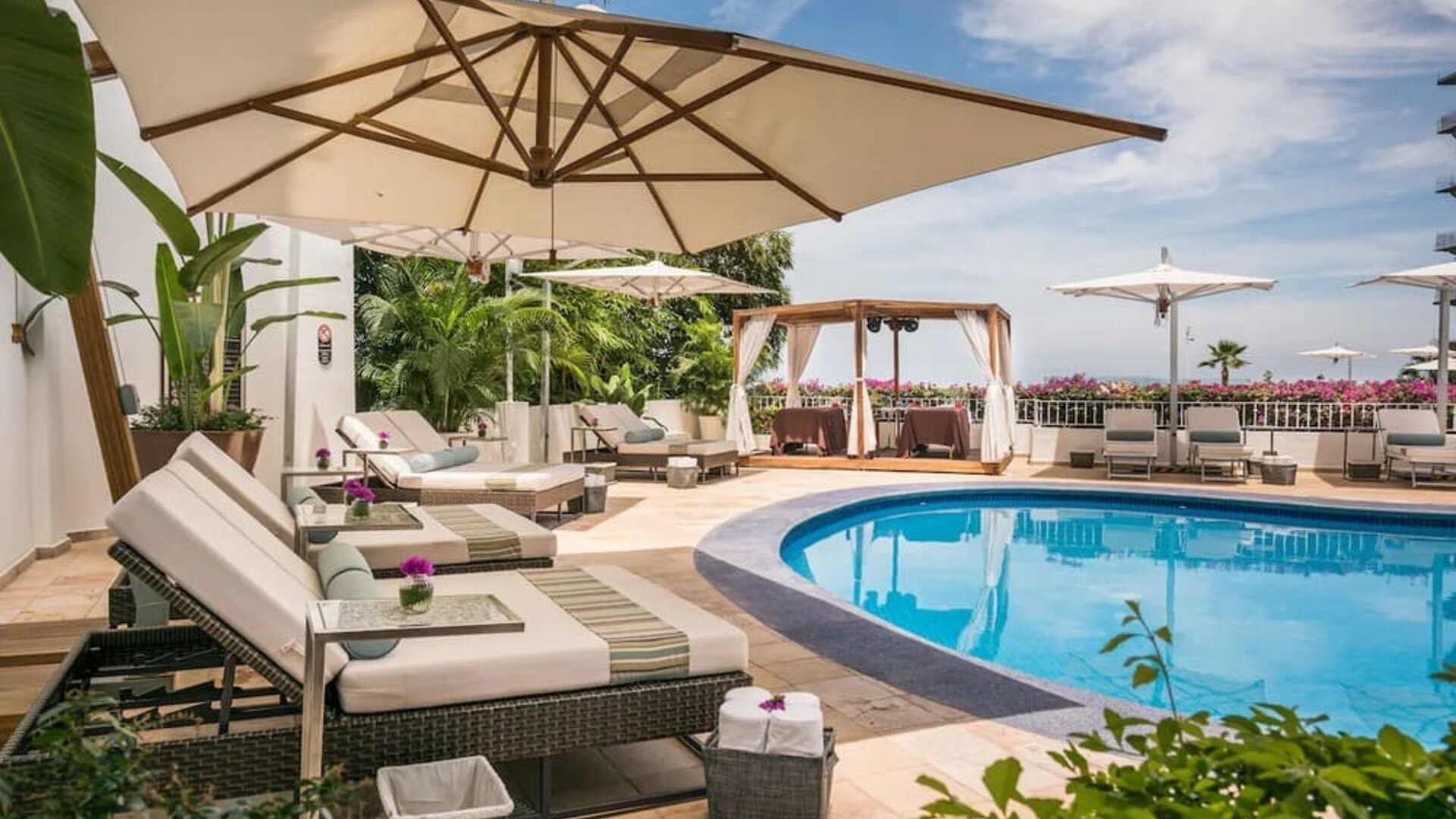 Stunning outdoor pool at Grand Miramar All Luxury Suites & Residences.