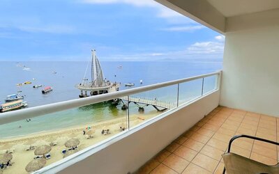 Day use room with outdoor terrace at Hotel Delfin PV Beach Resort.