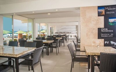 Dining room at Hotel Delfin PV Beach Resort.